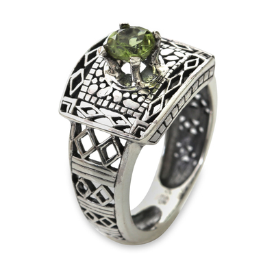 Handcrafted Peridot Ring with Silver Cutout Motifs