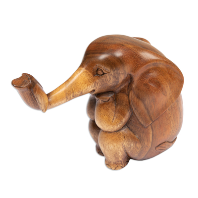 Sculpture of an Elephant Reading a Book Hand-Carved in Wood