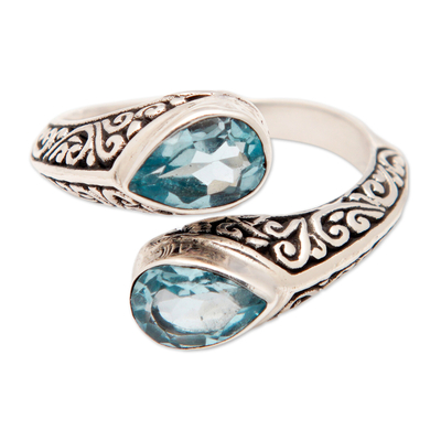 Sterling Silver Wrap Ring with Two Faceted Blue Topaz Stones