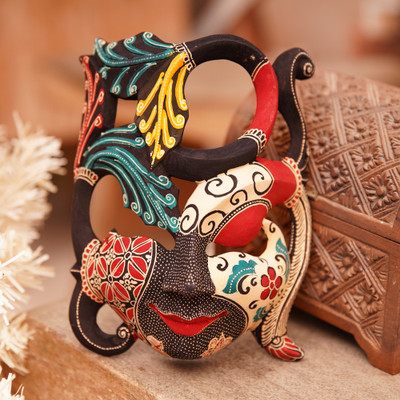 Handcrafted Nature-Themed Batik Pule Wood Mask from Java