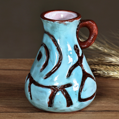 Turquoise and Brown Ceramic Vase with Ancient Pictographs