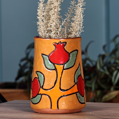 Warm-Toned Floral Ceramic Vase with Ancient Pictographs