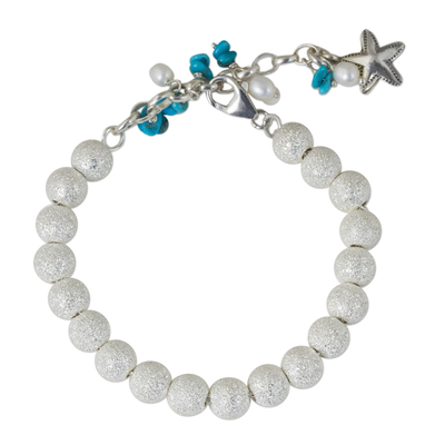Artisan Crafted Silver Bracelet with Starfish Charm